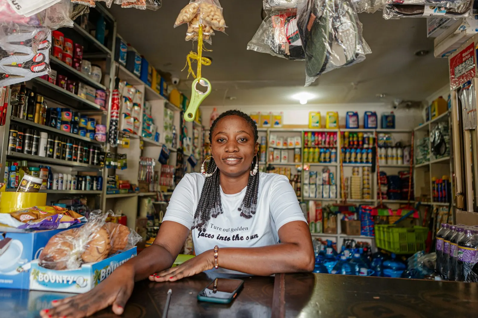 A local business owner at her storefront counter